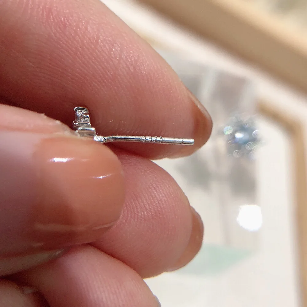 Silver Snowflake Zircon Stud Earrings - Image 3