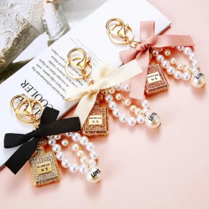 Perfume Bottle Pearl Bow Keychain